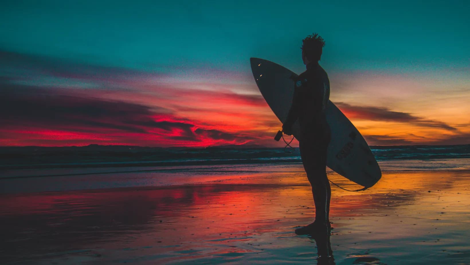 Surfer riding a wave at Arugam Bay